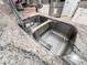 Double stainless steel kitchen sink with granite countertop at 3836 Vineyards Lake Nw Cir # U17, Kennesaw, GA 30144