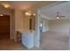 Bathroom featuring a large mirror, vanity area, and entryway view of a spacious bedroom at 4032 Duran Ln, Auburn, GA 30011