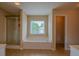 Bathroom with separate shower and tub, illuminated by natural light at 4032 Duran Ln, Auburn, GA 30011