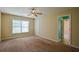 Comfortable bedroom with natural light, a ceiling fan, and ample space for furniture at 4032 Duran Ln, Auburn, GA 30011