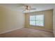 Well-lit bedroom with large window, perfect for relaxation and comfort at 4032 Duran Ln, Auburn, GA 30011