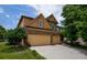 Charming two-story home with a well-manicured lawn and a spacious two-car garage at 4032 Duran Ln, Auburn, GA 30011