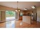 Bright kitchen features stainless steel appliances, wood cabinets, and stone countertops at 4032 Duran Ln, Auburn, GA 30011