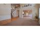 Spacious living area with hardwood accents, staircase and elegant architectural details at 4032 Duran Ln, Auburn, GA 30011