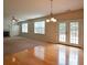 Open-concept living area with fireplace, built-ins, and bright windows offering a seamless flow to the outdoors at 4032 Duran Ln, Auburn, GA 30011