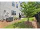 Backyard with patio, grill and green space at 8215 Harlond Way, Suwanee, GA 30024