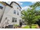 Backyard with patio, grill and green space at 8215 Harlond Way, Suwanee, GA 30024