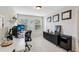 Bright home office with dual monitors and ample natural light at 8215 Harlond Way, Suwanee, GA 30024