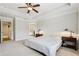 Spacious main bedroom with access to the ensuite bathroom at 8215 Harlond Way, Suwanee, GA 30024