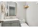 Chic powder room featuring modern fixtures and stylish decor at 8215 Harlond Way, Suwanee, GA 30024