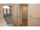 Bathroom featuring a peek into the bedroom and closet with a neutral color palette throughout at 1000 Silver Summit Se Dr, Conyers, GA 30094