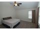 Bedroom with a ceiling fan, neutral carpet, window, and light walls showcasing comfort and relaxation at 1000 Silver Summit Se Dr, Conyers, GA 30094