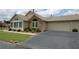 Ranch home with attached garage and brick and vinyl exterior at 1000 Silver Summit Se Dr, Conyers, GA 30094