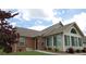 Charming brick and siding home with well-maintained lawn and manicured landscaping at 1000 Silver Summit Se Dr, Conyers, GA 30094