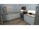 Well-equipped kitchen with stainless steel appliances and a functional layout, perfect for cooking at 1000 Silver Summit Se Dr, Conyers, GA 30094
