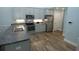 Modern kitchen with stainless steel appliances, granite countertops, and ample cabinet space at 1000 Silver Summit Se Dr, Conyers, GA 30094