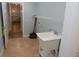 Practical laundry area with utility sink, ample storage, and easy access to additional rooms at 1000 Silver Summit Se Dr, Conyers, GA 30094
