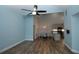 Inviting living room with adjacent dining area and view into the modern kitchen at 1000 Silver Summit Se Dr, Conyers, GA 30094