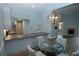 Spacious living and dining area featuring a fireplace and durable flooring, great for entertaining at 1000 Silver Summit Se Dr, Conyers, GA 30094
