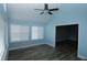 Bright sunroom with multiple windows and view to another room at 1000 Silver Summit Se Dr, Conyers, GA 30094