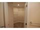 Walk-in closet with adjustable wire shelving providing ample storage in a carpeted space at 1000 Silver Summit Se Dr, Conyers, GA 30094