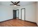 This bedroom has warm wood-look floors, ceiling fan, and plenty of closet space at 2091 Parker Ranch Se Rd, Atlanta, GA 30316