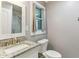 Elegant bathroom showcasing granite countertops and a modern vanity at 2711 Fairlane Dr, Atlanta, GA 30340