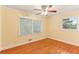 Bedroom featuring hardwood floors, ceiling fan, and bright windows with natural light at 2711 Fairlane Dr, Atlanta, GA 30340