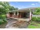Charming single-story home with a brick facade and a covered carport at 2711 Fairlane Dr, Atlanta, GA 30340