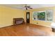 Bright living room featuring hardwood floors, a large window, and a classic design at 2711 Fairlane Dr, Atlanta, GA 30340