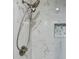 Modern shower with dual showerheads and marble tile at 2711 Fairlane Dr, Atlanta, GA 30340