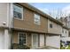 Townhome backyard features privacy fence, door and patio for outdoor enjoyment at 2850 Vining Ridge Ter, Decatur, GA 30034