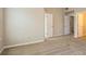 Spacious bedroom with neutral walls and carpeting; multiple closets and doors at 2850 Vining Ridge Ter, Decatur, GA 30034