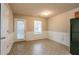 Inviting dining area with neutral walls, chair rail detail, and access to backyard at 2850 Vining Ridge Ter, Decatur, GA 30034