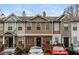 Charming townhome with diverse facade, well-maintained landscaping, and convenient front parking at 2850 Vining Ridge Ter, Decatur, GA 30034