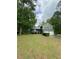 Two-story home featuring a two-car garage and well-manicured front yard at 49 Patty Dr, Dallas, GA 30157