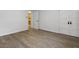 Spacious bedroom featuring luxury vinyl plank flooring and a view to closet at 100 Biscayne Nw Dr # C1, Atlanta, GA 30309