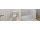 Well-maintained bathroom with a toilet, tub, and classic finishes at 2613 Winterthur Main Nw, Kennesaw, GA 30144