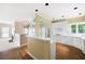 Beautiful kitchen featuring hardwood floors, modern appliances, and a seamless connection to the living area at 2613 Winterthur Main Nw, Kennesaw, GA 30144