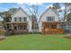 Two stylish two-story homes featuring inviting front porches and landscaped front yards create curb appeal at 826 Gaston Sw St, Atlanta, GA 30310