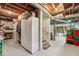 Unfinished basement with exposed ceiling near stairs and adjacent closet at 1501 Memory Se Ln, Smyrna, GA 30080