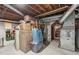 Unfinished basement with exposed ceiling, leading to additional storage opportunities at 1501 Memory Se Ln, Smyrna, GA 30080