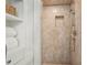 Bathroom showcasing a walk-in shower with tiled walls and a built in shower niche at 1501 Memory Se Ln, Smyrna, GA 30080