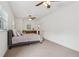 Bedroom featuring carpet, ceiling fans, multiple windows, a kitchenette and a couch at 1501 Memory Se Ln, Smyrna, GA 30080