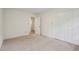 A spacious bedroom features neutral tones, carpeted floors, and bright natural light at 1501 Memory Se Ln, Smyrna, GA 30080