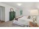 Bright bedroom with neutral walls, carpet flooring, and windows allowing natural light at 1501 Memory Se Ln, Smyrna, GA 30080
