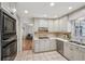 Bright kitchen with stainless steel appliances and tile flooring, perfect for cooking at 1501 Memory Se Ln, Smyrna, GA 30080
