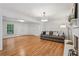 Spacious living room with fireplace, neutral paint, hardwood floors and natural lighting at 1501 Memory Se Ln, Smyrna, GA 30080