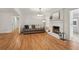 Large living room with fireplace, hardwood floors and natural lighting throughout at 1501 Memory Se Ln, Smyrna, GA 30080