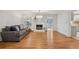 Open-concept living room with fireplace and hardwood floors, perfect for gatherings at 1501 Memory Se Ln, Smyrna, GA 30080